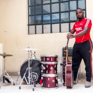 Mr Ogama, incharge of music, showcases some of the instruments in school.